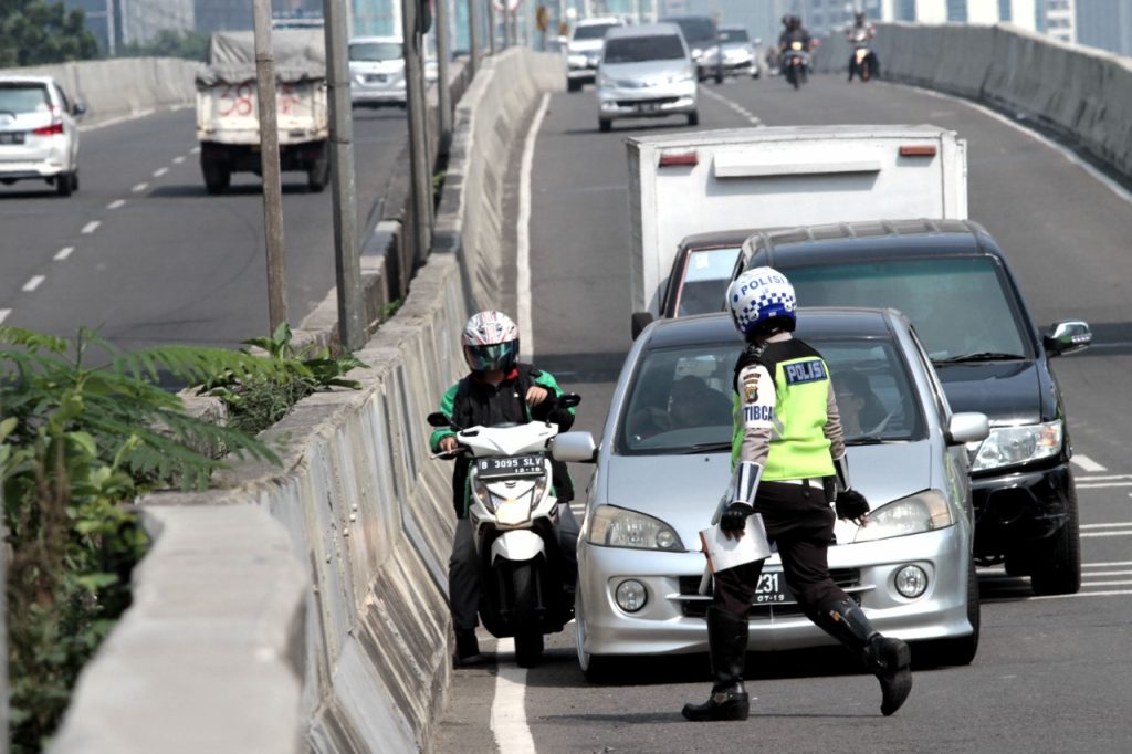 Peran Polisi Lalu Lintas